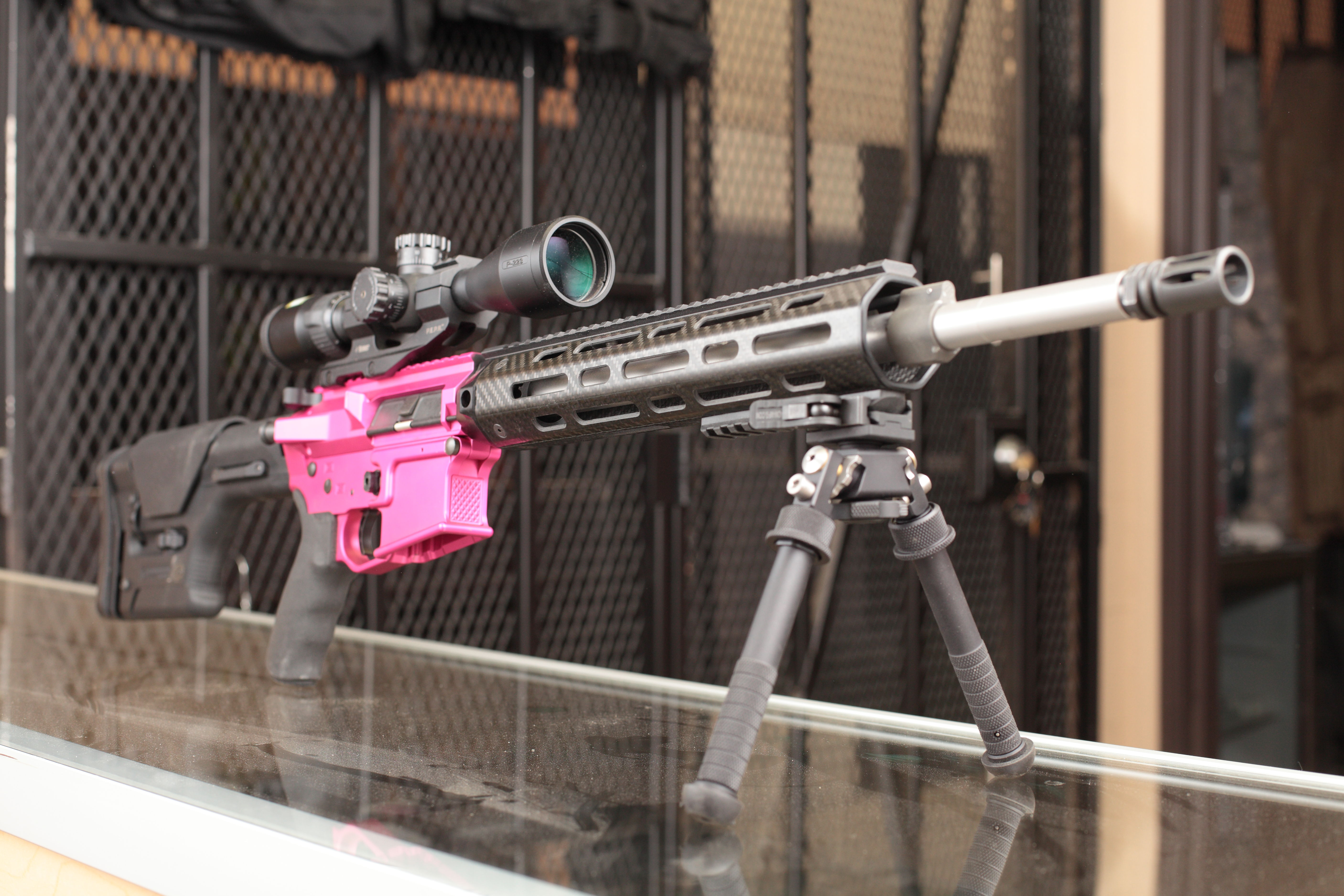 AR-15 .223/5.56 rifle with a Sun Devil upper and lower, and a Magpul PRS bu...